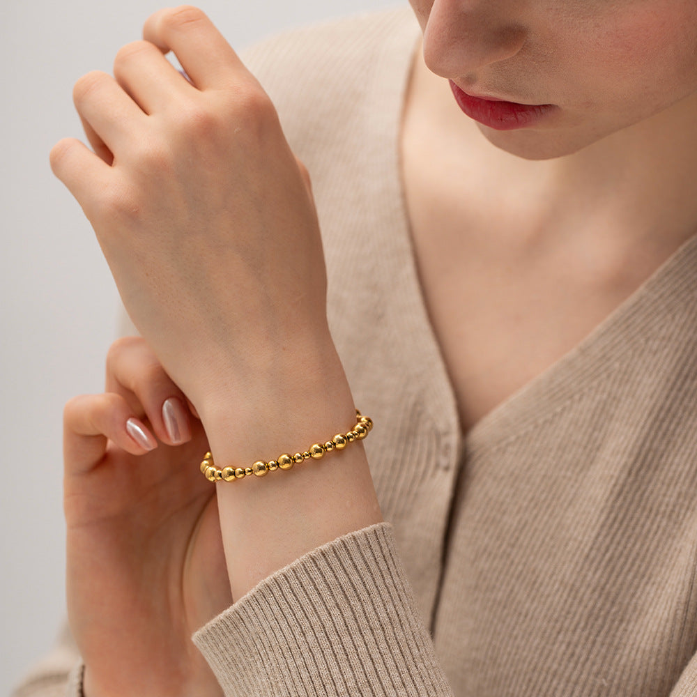 Stainless steel 18k gold-plated round beaded bracelet