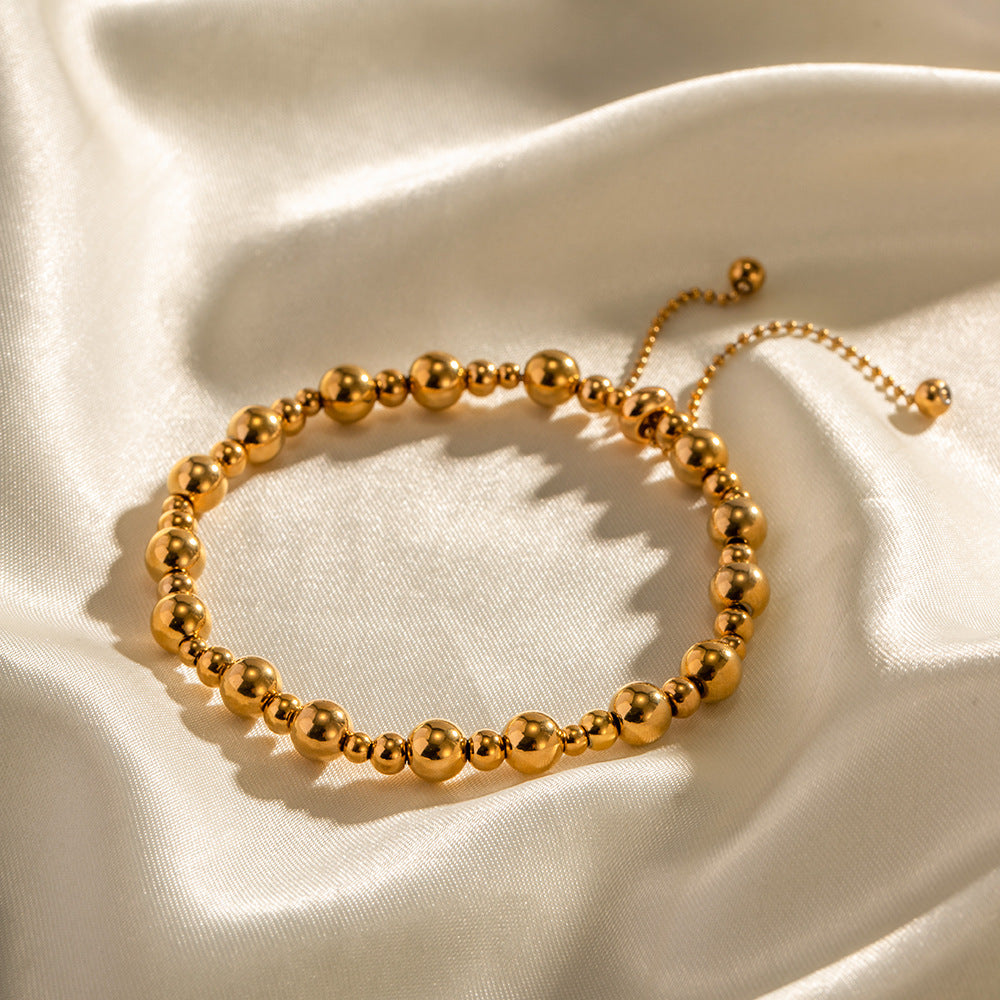 Stainless steel 18k gold-plated round beaded bracelet