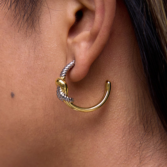 Knot shaped titanium steel earrings