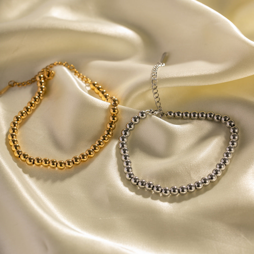 Stainless steel 18k gold-plated round beaded bracelet